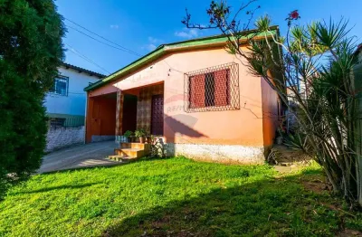 Casa com 4 quartos à venda na Rua Justino Valesco, 205, Barnabé, Gravataí