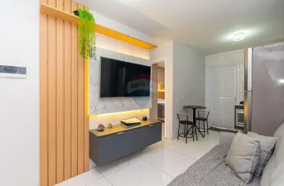 Casa de 02 dormitórios mobiliada com móveis planejados e espaço gourmet com churrasqueira