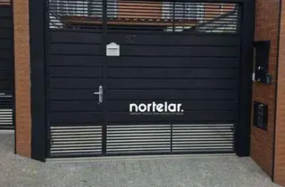Área construída: 95 m2 .     àrea terreno: 101 m2 	garagem para 02 veículos 	2 suítes com varandas 	sala 	lavabo 	copa, cozinha e área gourmet integra