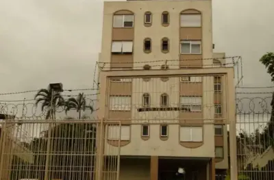 Otima localização ed. pequeno com elevador amplo apto.  1 dorm. com garagem