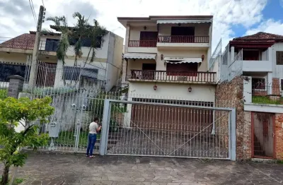 Casa com 6 quartos à venda na Rua Tomaz Edison, 416, Santo Antônio, Porto Alegre