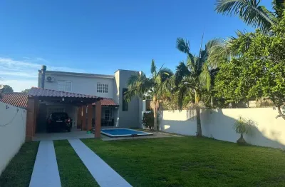 Urubatan , linda casa projetada com 3 dormitórios sendo 2 em suítes + peças e am