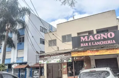 Predio na massot ed. com 3 aptos.2 lojas e 3 um estacionamento, preço de ocasião