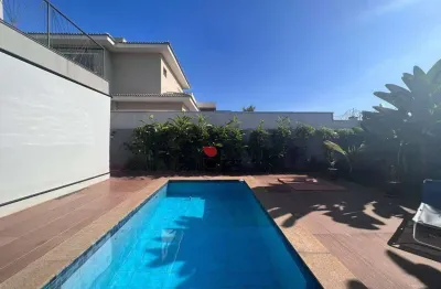 Casa alto padrão com 247m², 4 quartos para locação no condomínio alphaville em ribeirão preto/sp i imobiliária brioni imóveis