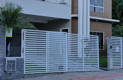 Casa com 4 quartos à venda na rua arandú, 115, pedra branca, palhoça por r$ 1.900.000