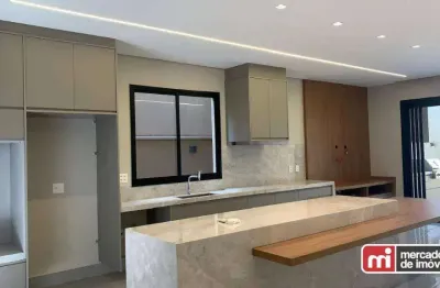 Casa térrea, 4 suítes, sendo 1 máster com closet, cuba e ducha dupla, 3 salas de estar e jantar integradas, pé direito duplo, varanda gourmet, piscina