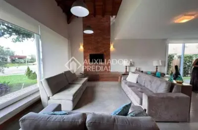 Casa em condomínio fechado com 5 quartos à venda na avenida homero ribeiro, 1, remanso, xangri-lá, 273 m2 por r$ 1.900.000