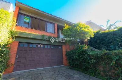 Casa em condomínio fechado com 3 quartos à venda na rua felipe becker, 419, três figueiras, porto alegre, 300 m2 por r$ 1.195.000