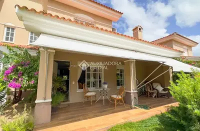 Casa em condomínio fechado com 4 quartos à venda na avenida paraguassu, 725, centro, xangri-lá, 167 m2 por r$ 1.690.000