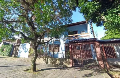 Casa com 4 quartos à venda na avenida cruz alta, 110, nonoai, porto alegre, 419 m2 por r$ 2.000.000