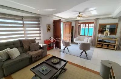 Casa com 3 quartos à venda na rua doutor francisco de sá brito, 240, partenon, porto alegre, 266 m2 por r$ 1.100.000