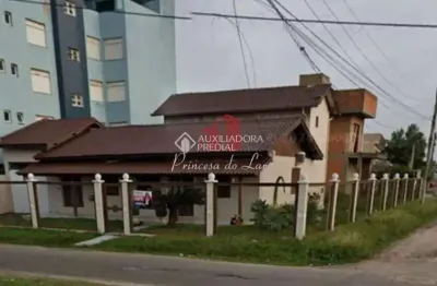 Casa com 3 quartos à venda na caldas junior, 2952, centro, tramandaí, 182 m2 por r$ 1.200.000