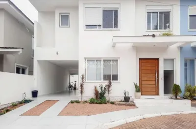 Casa em condomínio fechado com 4 quartos à venda na rua república, 2050, harmonia, canoas, 212 m2 por r$ 945.000