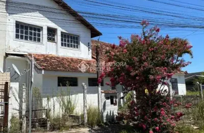 Casa com 4 quartos à venda na Rua Herbert Rhodenbuschu, 152, Centro, Guaíba, 300 m2 por R$ 350.000
