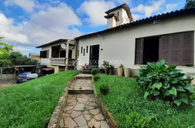 Casa em condomínio fechado com 5 quartos à venda na rua são cristiano, 67, santa tereza, porto alegre, 399 m2 por r$ 750.000
