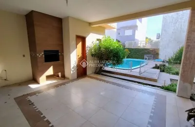 Casa em condomínio fechado com 3 quartos à venda na rua eroni soares machado, 104, hípica, porto alegre, 322 m2 por r$ 960.000