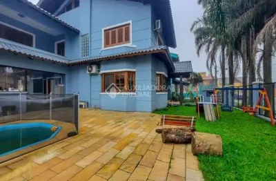 Casa em condomínio fechado com 4 quartos à venda na rua doutor ladislau ruttkay, 16, sarandi, porto alegre, 332 m2 por r$ 1.250.000