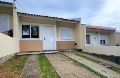 Casa em condomínio fechado com 2 quartos à venda na rua oscar schick, 2350, formoza, alvorada, 66 m2 por r$ 255.000