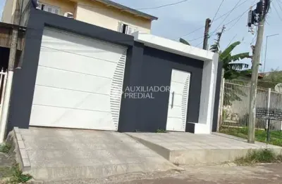Casa com 5 quartos à venda na rua cento e trinta e cinco, 294, jardim algarve, alvorada, 150 m2 por r$ 410.000