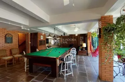 Casa em condomínio fechado com 3 quartos à venda na rua inhanduí, 252, cristal, porto alegre, 309 m2 por r$ 1.600.000