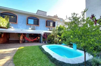 Casa em condomínio fechado com 3 quartos à venda na rua inhanduí, 252, cristal, porto alegre, 309 m2 por r$ 1.520.000