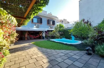 Casa em condomínio fechado com 3 quartos à venda na rua inhanduí, 252, cristal, porto alegre, 309 m2 por r$ 1.520.000