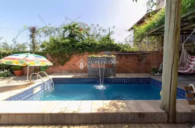 Casa com 4 quartos à venda na rua doutor paulino guerra, 575, jardim itu sabará, porto alegre, 345 m2 por r$ 1.300.000