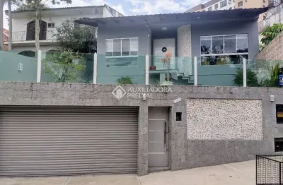 Casa com 3 quartos à venda na rua fernando abbott, 1175, cristo redentor, porto alegre, 206 m2 por r$ 1.690.000
