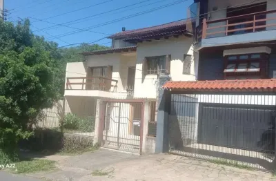 Casa com 3 quartos à venda na avenida doutor petrônio portella, 1140, parque santa fé, porto alegre, 287 m2 por r$ 549.000