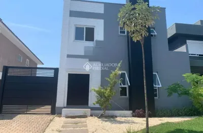Casa em condomínio fechado com 3 quartos à venda na avenida senador salgado filho, 8500, jardim krahe, viamão, 220 m2 por r$ 1.500.000