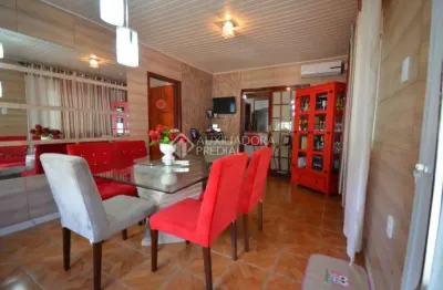 Casa em condomínio fechado com 3 quartos à venda na rua dom vitório monego, 101, cruzeiro, gravataí, 200 m2 por r$ 500.000
