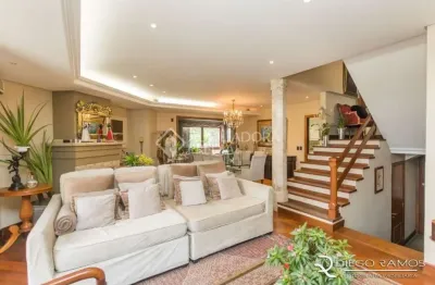Casa em condomínio fechado com 6 quartos à venda na rua gustavo schmidt, 277, três figueiras, porto alegre, 445 m2 por r$ 2.999.000