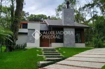 Casa em condomínio fechado com 4 quartos à venda na das caneleiras, 330, mato queimado, gramado, 376 m2 por r$ 4.800.000