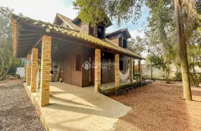 Casa com 2 quartos à venda na avenida assis brasil, 249, flórida, guaíba, 155 m2 por r$ 450.000