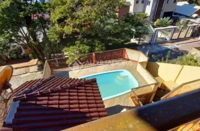 Casa em condomínio fechado com 3 quartos à venda na rua aladim de araújo pinto, 353, centro, guaíba, 308 m2 por r$ 1.590.000