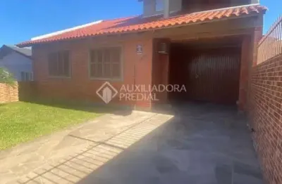 Casa em condomínio fechado com 3 quartos à venda na rua coronel inácio de quadros, 1171, coronel nassuca, guaíba, 230 m2 por r$ 430.000