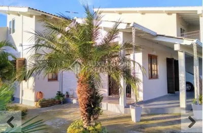 Casa em condomínio fechado com 3 quartos à venda na clara, santa, 695, jardim dos lagos, guaíba, 170 m2 por r$ 555.000
