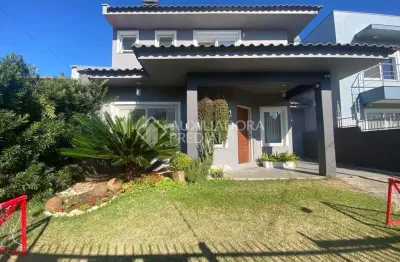 Casa com 3 quartos à venda na rua ivo lessa silveira, 160, parque 35, guaíba, 270 m2 por r$ 1.200.000