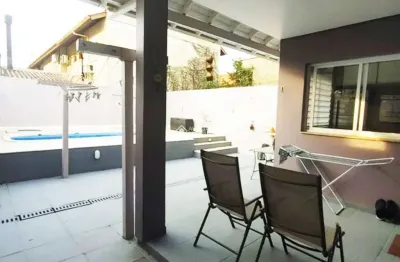 Casa em condomínio fechado com 3 quartos à venda na rua república, 2050, harmonia, canoas, 86 m2 por r$ 850.000