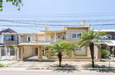 Casa com 5 quartos à venda na rua escócia, 51, marechal rondon, canoas, 261 m2 por r$ 2.150.000