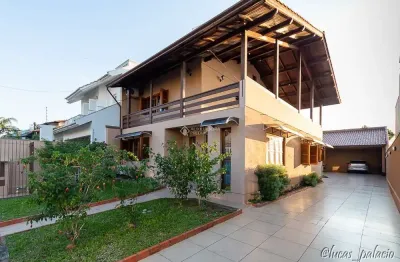 Casa com 4 quartos à venda na rua das angélicas, 344, estância velha, canoas, 252 m2 por r$ 1.100.000