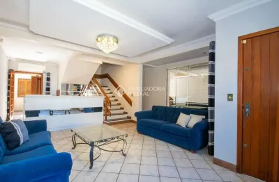 Casa em condomínio fechado com 4 quartos à venda na rua santini longoni, 293, marechal rondon, canoas, 300 m2 por r$ 990.000