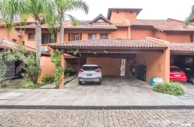 Casa em condomínio fechado com 4 quartos à venda na rua ênio andrade, 320, três figueiras, porto alegre, 520 m2 por r$ 8.999.000