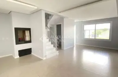 Casa em condomínio fechado com 3 quartos à venda na rua ravena, 66, estância velha, canoas, 125 m2 por r$ 689.990