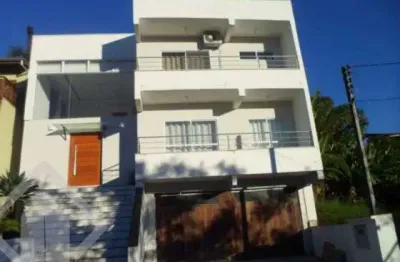 Casa em condomínio fechado com 3 quartos à venda na avenida senador salgado filho, 6614, jardim krahe, viamão, 400 m2 por r$ 950.000