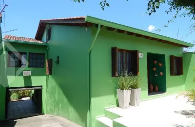 Casa em condomínio fechado com 4 quartos à venda na rua nápoli, 71, santa isabel, viamão, 249 m2 por r$ 550.000