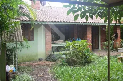 Casa em condomínio fechado com 4 quartos à venda na rua caroba, 105, cantegril, viamão, 109 m2 por r$ 390.000