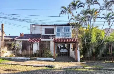 Casa com 6 quartos à venda na rua fábio de barros, 388, nonoai, porto alegre, 294 m2 por r$ 693.000