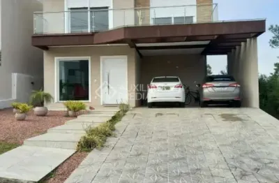Casa em condomínio fechado com 3 quartos à venda na avenida senador salgado filho, 8500, jardim krahe, viamão, 200 m2 por r$ 1.800.000