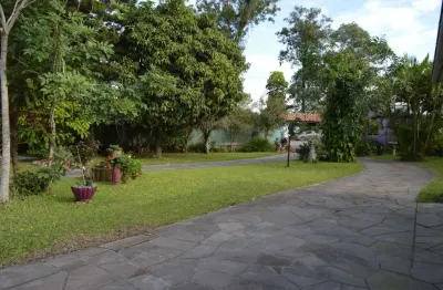 Casa com 3 quartos à venda na avenida do lami, 1580, belém novo, porto alegre, 300 m2 por r$ 980.000